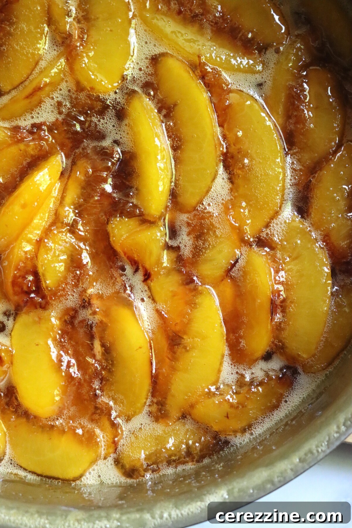 Finished peach preserves in the pan before going into the jar.