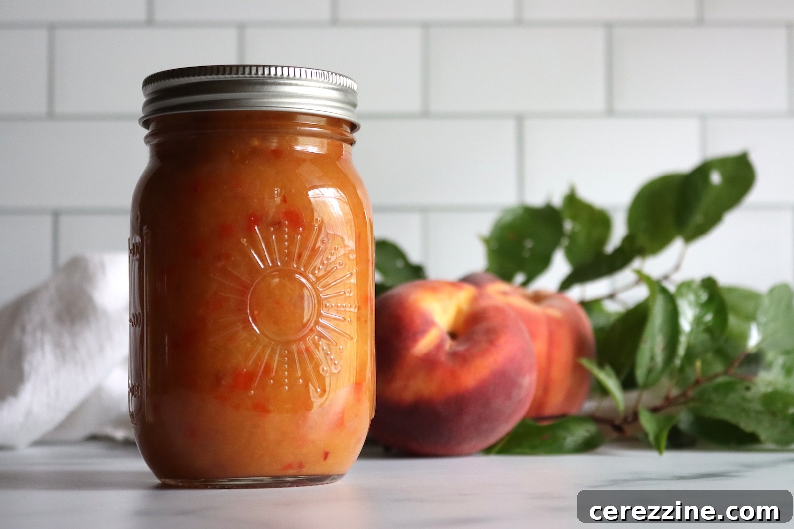 Peach BBQ Sauce in a pint jar