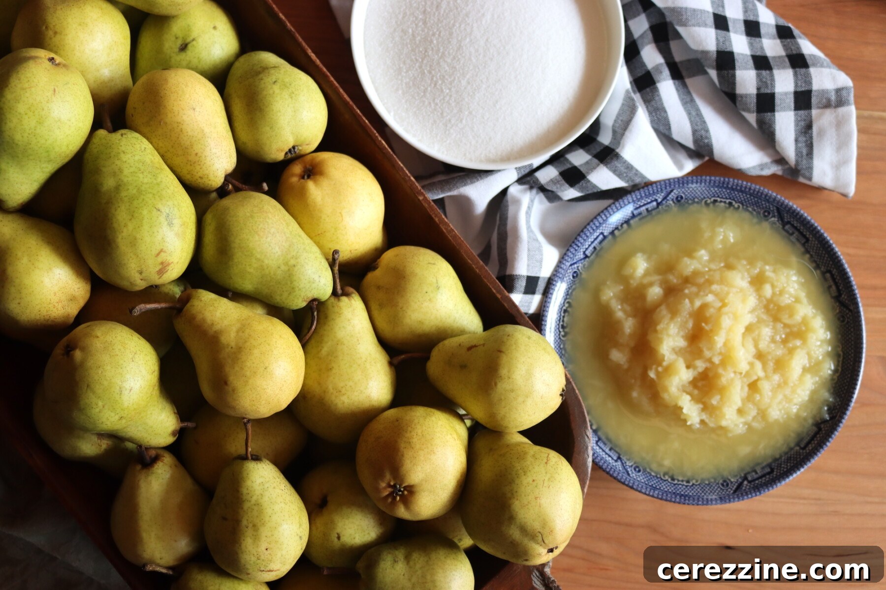 Fresh pears, sugar, and crushed pineapple ready for making pear honey